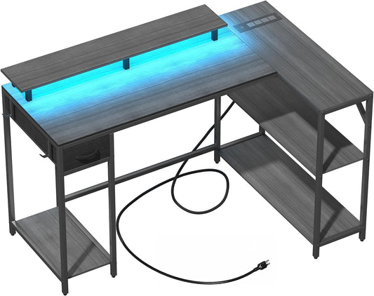 47 Inch L Shaped Desk Gaming Desk with LED Strip & Power Outlet, Reversible L-Shaped Computer Desk with Storage Shelf & Drawer, Corner Desk with Hook & Monitor Stands, Home Office Desk